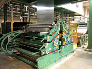 Chemical Applicator appliies "Cromate" to the strip allowing the paint to adhere to the material.